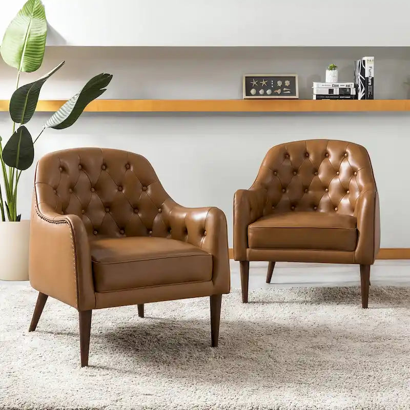 Fauteuil baquet classique en cuir véritable avec pieds en bois et dossier capitonné, lot de deux chaises.